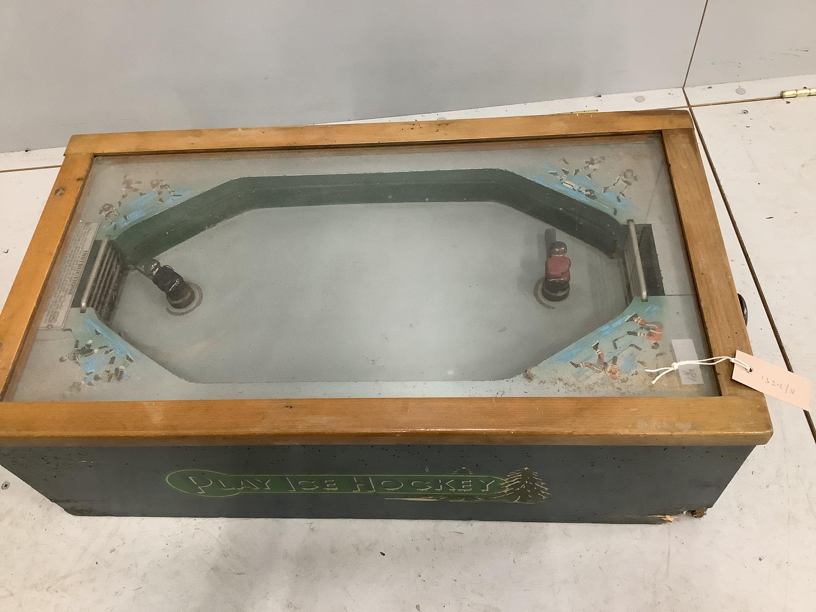 A vintage 'Play Ice Hockey' coin operated arcade game, width 81cm, depth 42cm, height 25cm (a.f.)